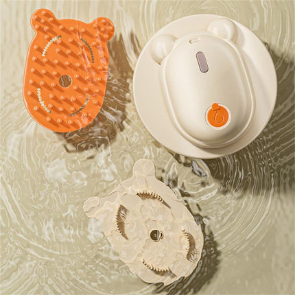 Cat hair removal brush set with a grooming comb and massage pad on a water surface.