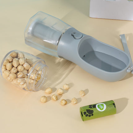 3-in-1 portable pet water bottle with food container and waste bags, perfect for outdoor pet care.